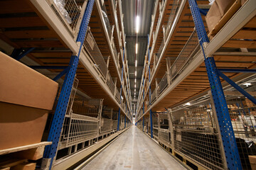 Aisle with shelves in a warehouse