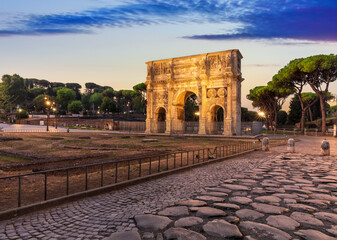 Famous Illuminated Arch of Constantine at sunset, no people, Rome, Italy