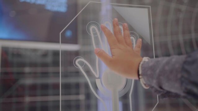 Business woman using a biometric decoder scans data from her hands