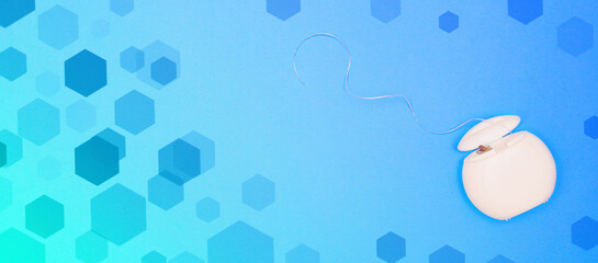 Dental floss word on a blue  bokeh effect background. Copy space.