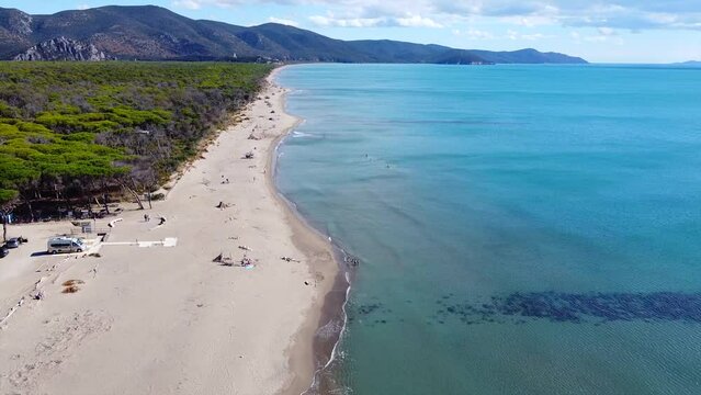Tilt up revealing video of the coastline of Alberese showing the sea and the beach (view to the south). Alberese, Maremma National Park in Tuscany (Grosseto).
