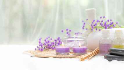 Obraz na płótnie Canvas Spa beauty massage health wellness background.  Spa Thai therapy treatment aromatherapy for body woman with purpule flower nature candle for relax and summer time