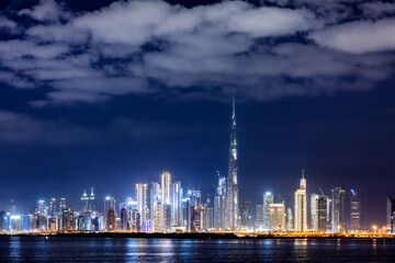 Skyscrapers skyline of Dubai UAE downtown with Burj Khalifa at night