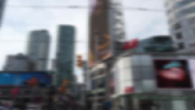 Yonge-Dundas Square, or Dundas Square. Public square at the southeast corner of the intersection of Yonge Street and Dundas Street East in Downtown Toronto, Ontario, Canada. Out of focus.