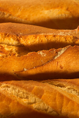 Different types of bread with warm colors