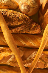 Different types of bread with warm colors