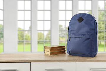 Desk of free space and school backpack. 