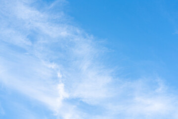 Beautiful cirrus clouds on blue sky on a sunny day background texture