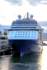 Celebrity Kreuzfahrtschiff cruiseship cruise ship liner Eclipse arrives into port of Vancouver, Canada from Alaska cruise during sunrise twilight blue hour