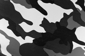 White black camouflage pattern fabric background texture. military and hunting clothes. winter and snow camouflage