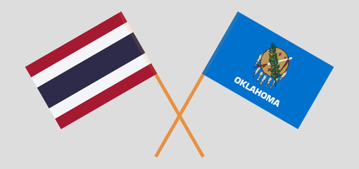Crossed flags of Thailand and The State of Oklahoma. Official colors. Correct proportion
