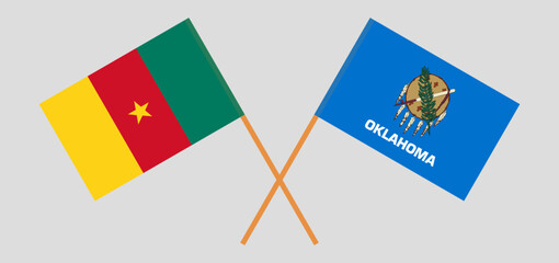 Crossed flags of Cameroon and The State of Oklahoma. Official colors. Correct proportion