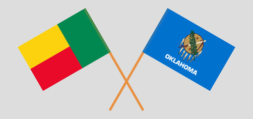 Crossed flags of Benin and The State of Oklahoma. Official colors. Correct proportion