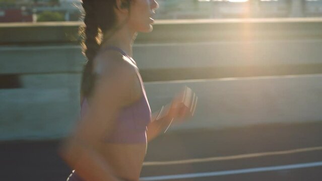 Fitness woman running fast, cardio city training and marathon exercise for speed, strong body and healthy wellness with lens flare. Focus, runner and young athlete in motivation, power and challenge