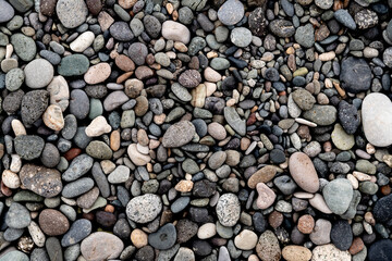 Pebbles on the beach. Pebbles texture.