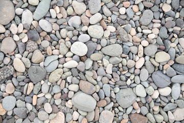 Pebbles on the beach. Pebbles texture.