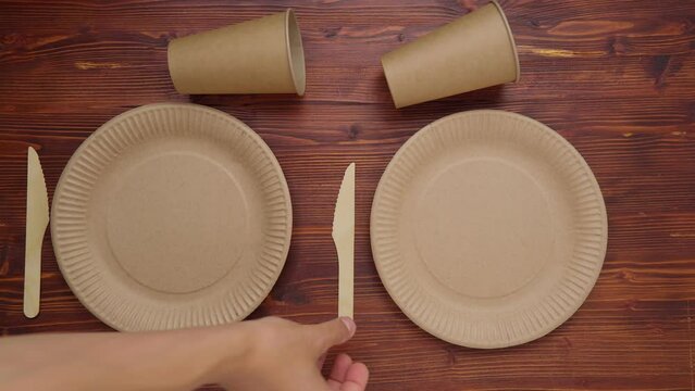 Eco friendly tableware, kraft paper food packaging and paper cups for street food packaging, plates, knives, forks. Top view