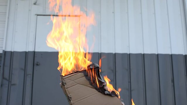 Dumpster Fire Large Orange Flames Lick Out of Trashcan Fire