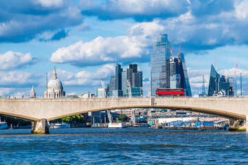 A view from the Embankment towards traffic on Waterloo bridge in London, UK in summertime