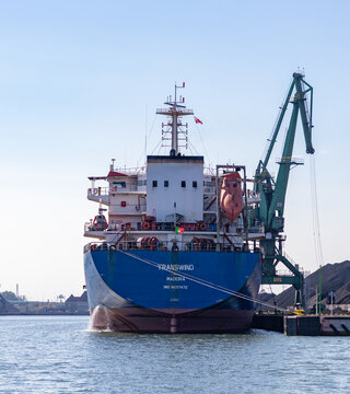 Gdansk, Poland - August 14, 2022: A picture of the stern of a cargo ship in the Gdansk Shipyard.