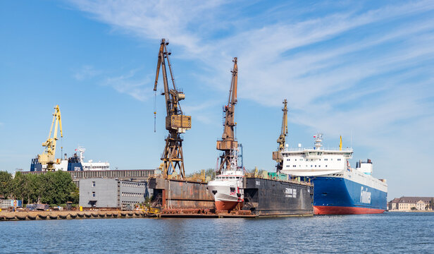 Gdansk, Poland - August 14, 2022: A picture of a ship being repaired in the Gdansk Shipyard.