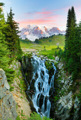 Myrtle Falls and Mt Rainier at sunrise. Myrtle Falls is located along Skyline Trail in the Paradise area of Mount Rainier National Park and is reached by hiking the trail 0.5 miles.