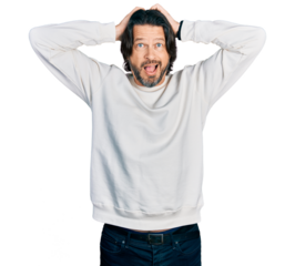 Middle age caucasian man wearing casual clothes crazy and scared with hands on head, afraid and surprised of shock with open mouth