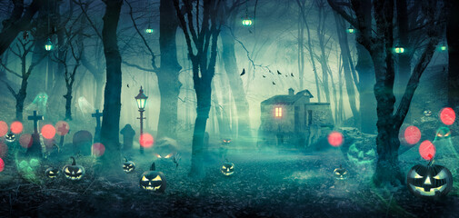 Halloween - Haunted House In Spooky Forest At Night With Pumpkins And Ghosts