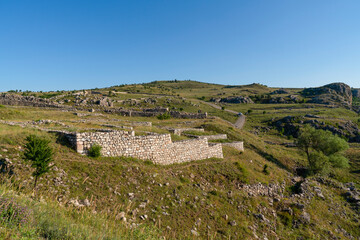 Fototapeta na wymiar General view of Hattusa was the capital of the Hittite Empire with some stone structures. Corum, Turkey.
