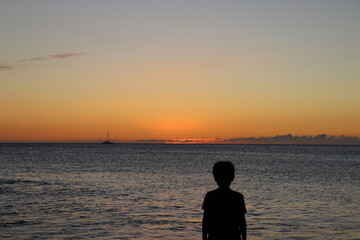 Fototapeta premium silhouette of a person on the beach