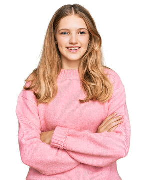 Beautiful young caucasian girl wearing casual winter sweater happy face smiling with crossed arms looking at the camera. positive person.