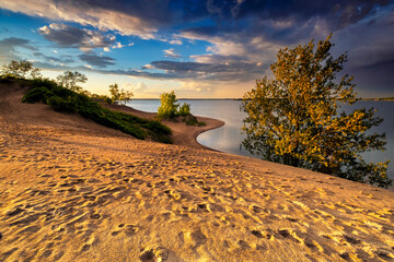 Sandbanks Provincial Park Ontario Canada with beautiful sunset landscapes, large bodies of water, waves, and stunning nature scenics