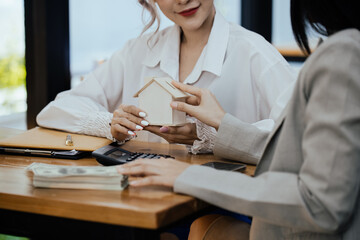 Group of young Asian business woman teamwork and presenting new projects in the office.