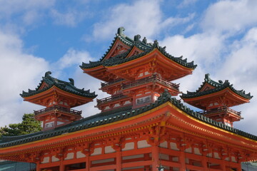 vermillon pagoda of the Heian shrine in Kyoto, Japan, on a bright sunny day with a blue sky