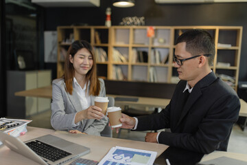 Person analyzing figures, Two businessman working on tablet and new startup marketing idea presentation, Business meeting discussion startup concept.