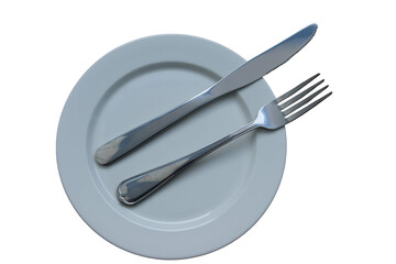 Fork and knife in empty white plate isolated on white background closeup.