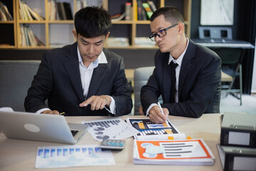 Technology and financial advisory services concert. Business teamwork and working on digital laptop computer with advisor showing plan of investment to clients at table office. Digital marketing.