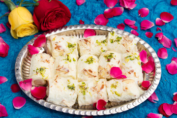 Indian Mithai Bread Malai Roll Rabdi Or Bengali Rabri Is Made Of Soft White Bread Slices, Dipped Soaked Or Dunked In Simmering Creamy Milk With Kesar, Khoya, Mawa, Mava, Khoa, Pista, Badam, Kaju
