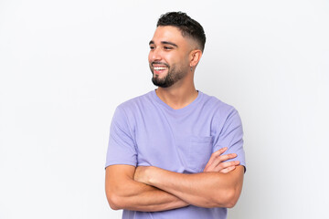 Obraz premium Young Arab handsome man isolated on white background happy and smiling