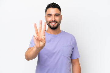 Fototapeta premium Young Arab handsome man isolated on white background happy and counting three with fingers