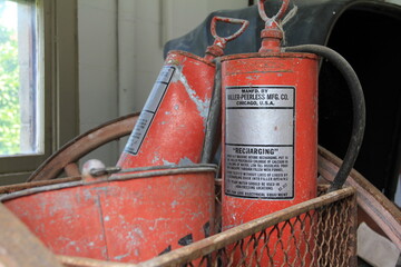 antique hand-pump fire extinguishers