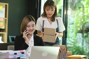 Businesswoman working with packaging box at home office, Business online influencer on social media concept, Online Selling, Online Shopping to market, 