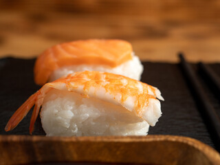 Japanese kitchen. Sushi on a dark background.