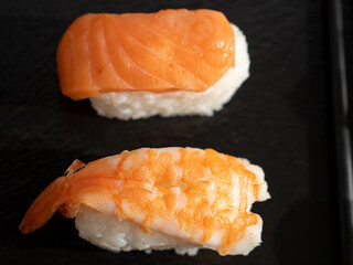Japanese kitchen. Sushi on a dark background.