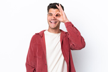 Young caucasian man isolated on white background showing ok sign with fingers