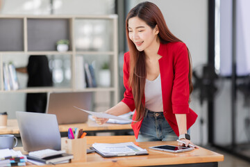 Business Documents, Auditor business Asian woman checking searching document legal financial report analysis TAX time, Asian accountant Documents data contract partner deal in the workplace.