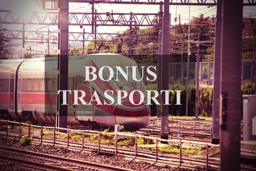 Train at sunset with the text "Bonus Trasporti" concept of bonus to travel 