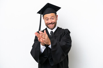 Middle age university graduate man isolated on white background applauding after presentation in a conference