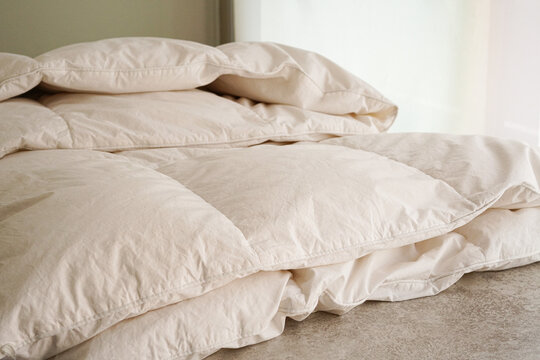 折り畳んだ羽毛布団