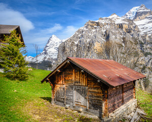 Fototapeta na wymiar ypical old wooden shed (barn) in the Bernese Oberland region of the Swiss Alps